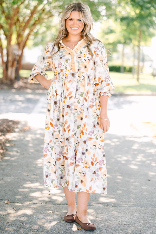 Plus Size cream floral midi dress with a ruffled V-neckline and tiered skirt in 100% cotton.