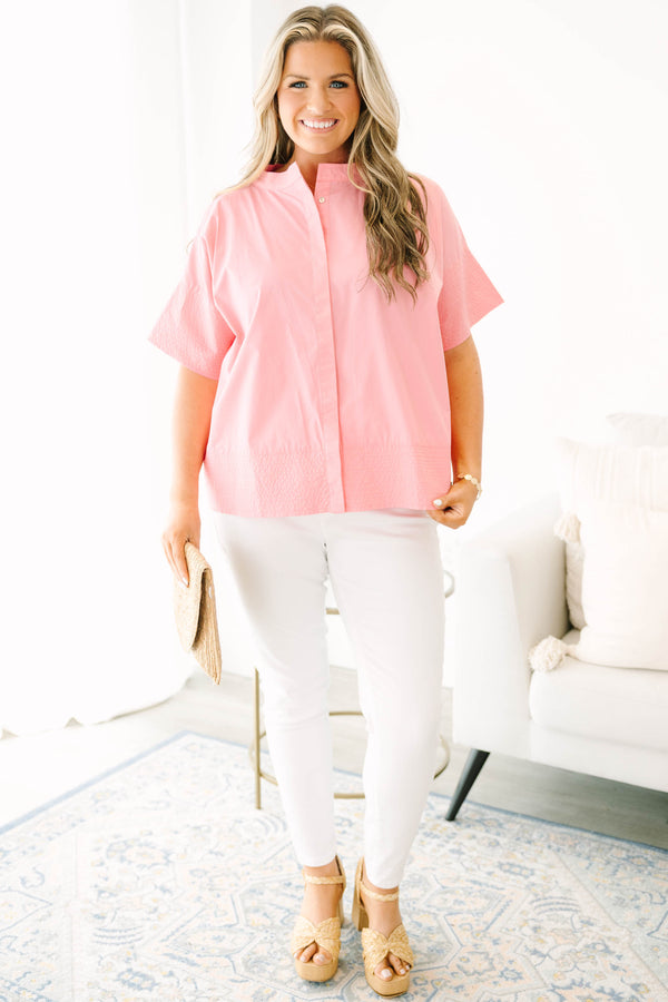 Plus Size pink short-sleeve poplin button-down top with a classic collar and textured hem.