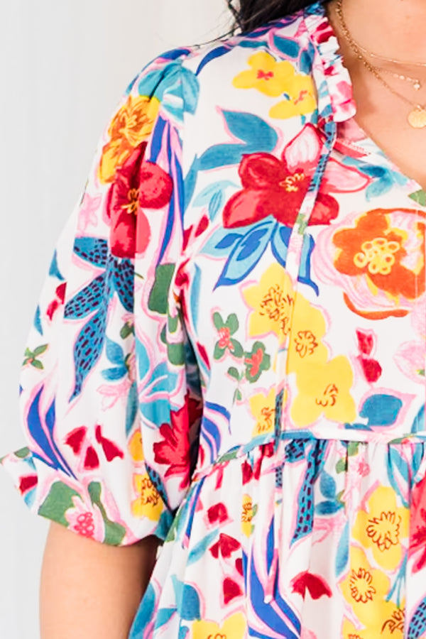 Chic Soul plus size clothing, white babydoll mid sleeve top with floral pattern and tassels at collar