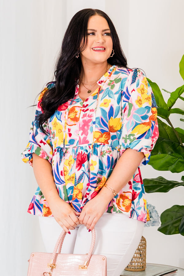 Chic Soul plus size clothing, white babydoll mid sleeve top with floral pattern and tassels at collar