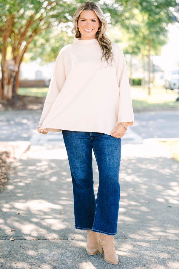 Plus Size taupe mock neck sweater with long wide sleeves and a relaxed fit.