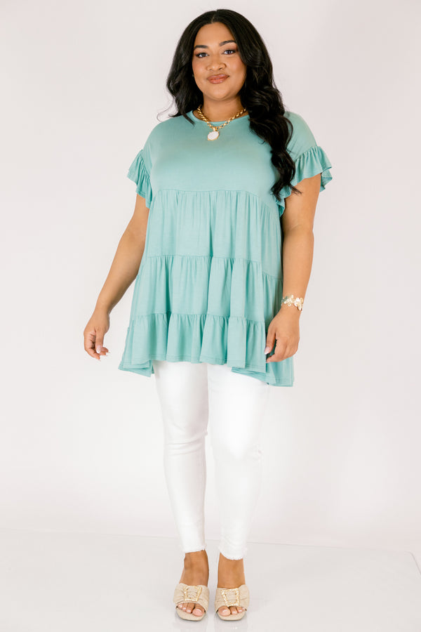 Plus Size teal tiered babydoll tunic with ruffled short sleeves and a round neckline.
