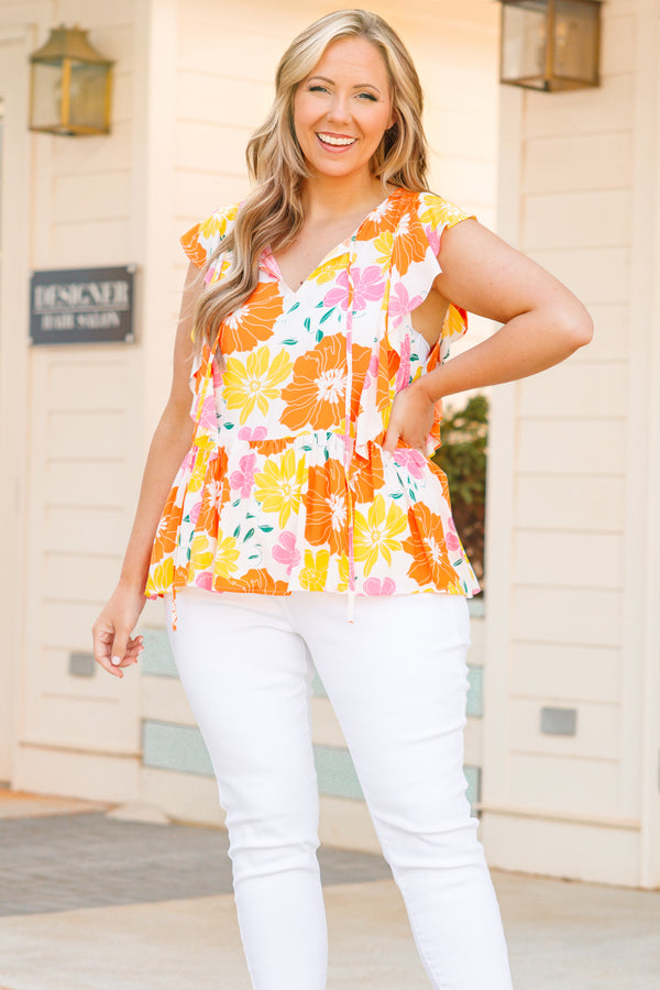 Chic Soul plus size clothing, cream top with orange and yellow floral pattern and ruffle sleeves
