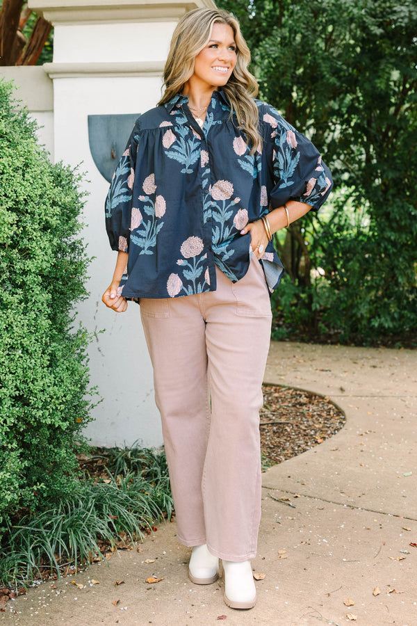 Plus Size navy floral button-up blouse with bubble sleeves and a collared neckline.