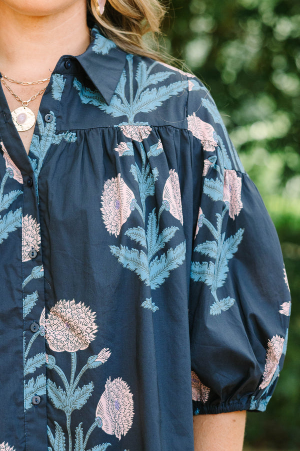 Plus Size navy floral button-up blouse with bubble sleeves and a collared neckline.