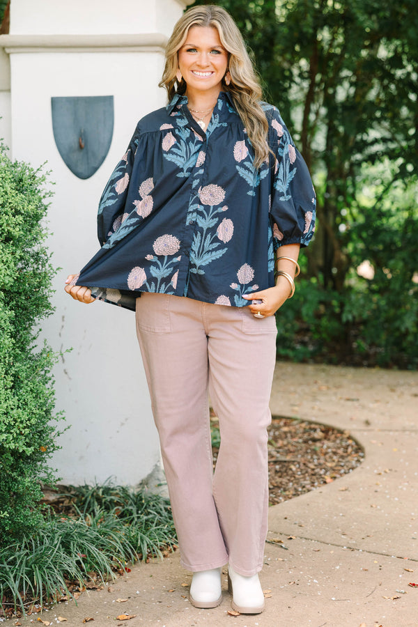 Plus Size navy floral button-up blouse with bubble sleeves and a collared neckline.