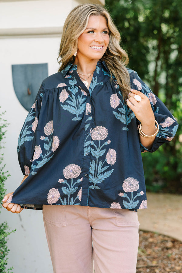 Plus Size navy floral button-up blouse with bubble sleeves and a collared neckline.