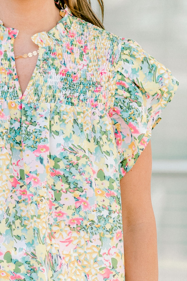Chic Soul plus size clothing, mustard multicolor small floral print short sleeve top with v cutout along neckline with ruffle sleeve and neck detail