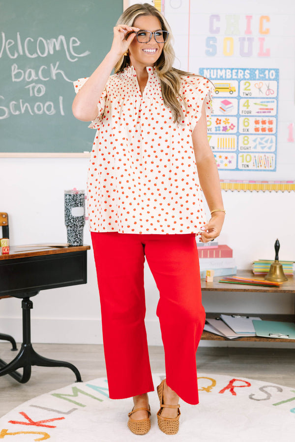 Plus size cream apple print top with flutter sleeves and smocked neckline for a flowy, feminine fit.
