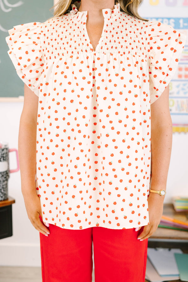Plus size cream apple print top with flutter sleeves and smocked neckline for a flowy, feminine fit.