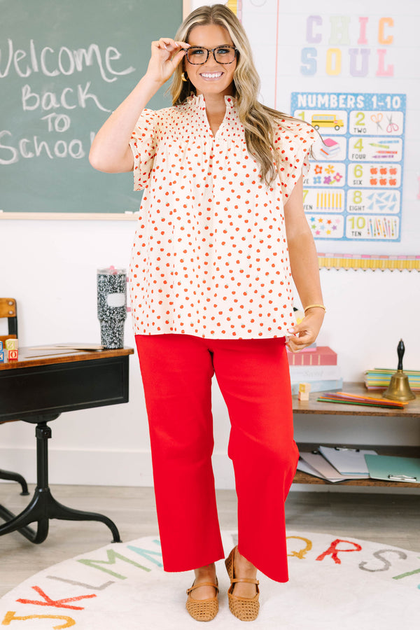 Plus size cream apple print top with flutter sleeves and smocked neckline for a flowy, feminine fit.