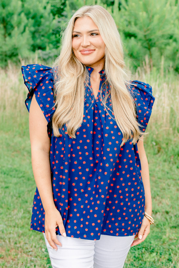 Chic Soul plus size clothing, navy short sleeve top with v cutout along neckline with collar and ruffle sleeve detail with small red apple print