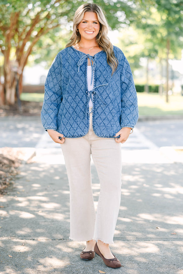 Plus Size quilted denim jacket with a diamond pattern, tie-front closures, and long sleeves.