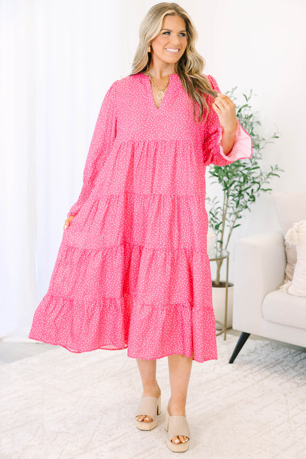 Plus size fuchsia polka dot midi dress with a flowy tiered silhouette and split v-neckline.