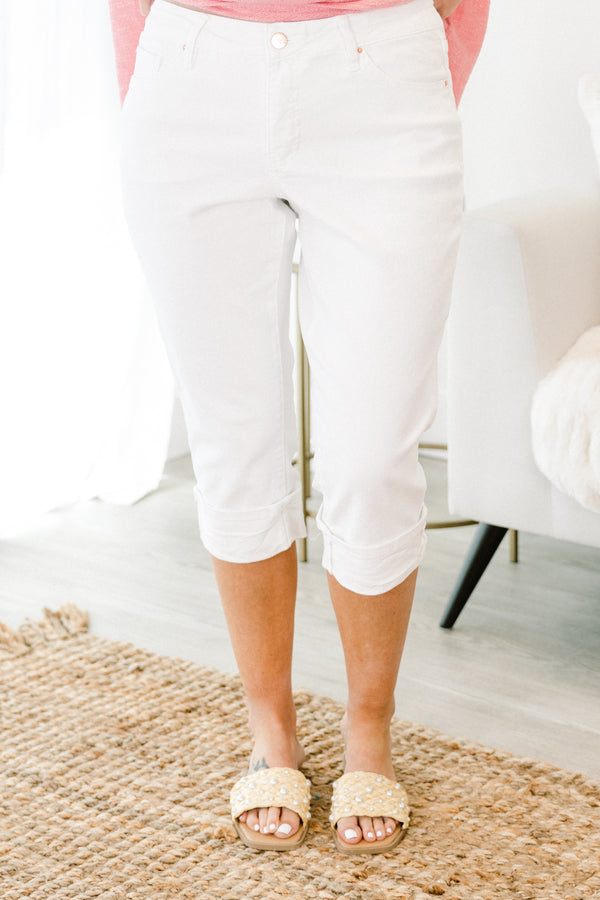 Chic Soul plus size clothing, mid-waisted white capris denim jeans with a gold button detailing and a cuffed bottom 