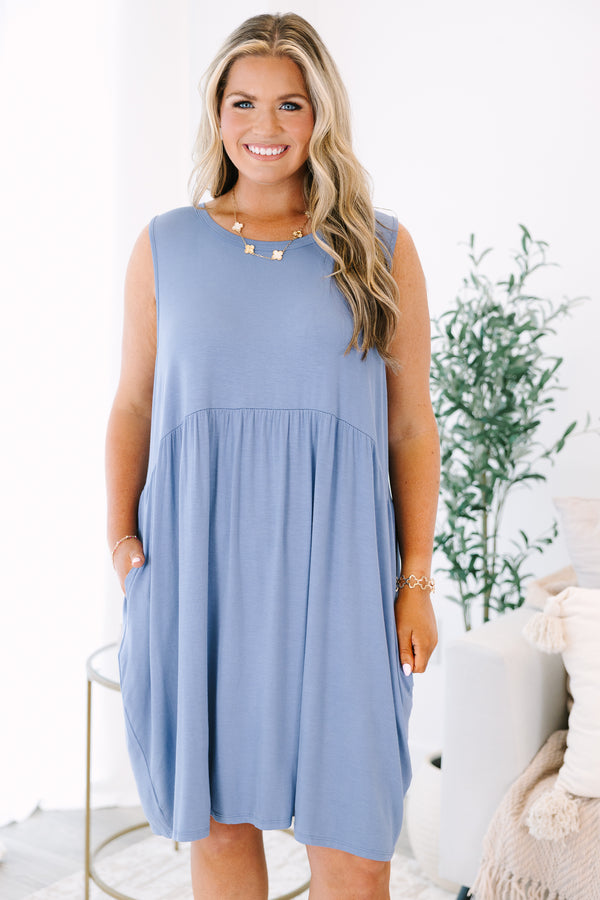 Plus Size sleeveless violet slate babydoll dress with a round neckline and side pockets.