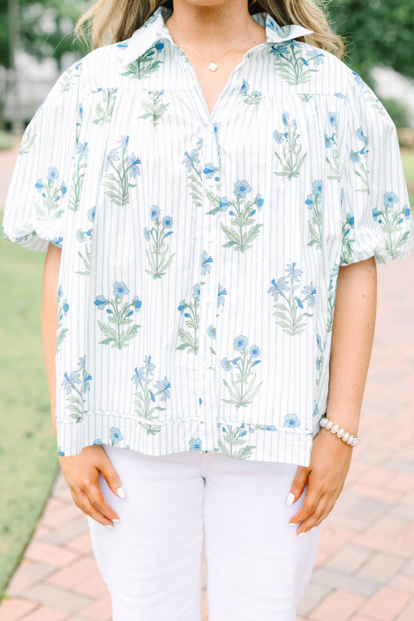 Plus Size blue and white striped button-down top with a floral print and puff sleeves.