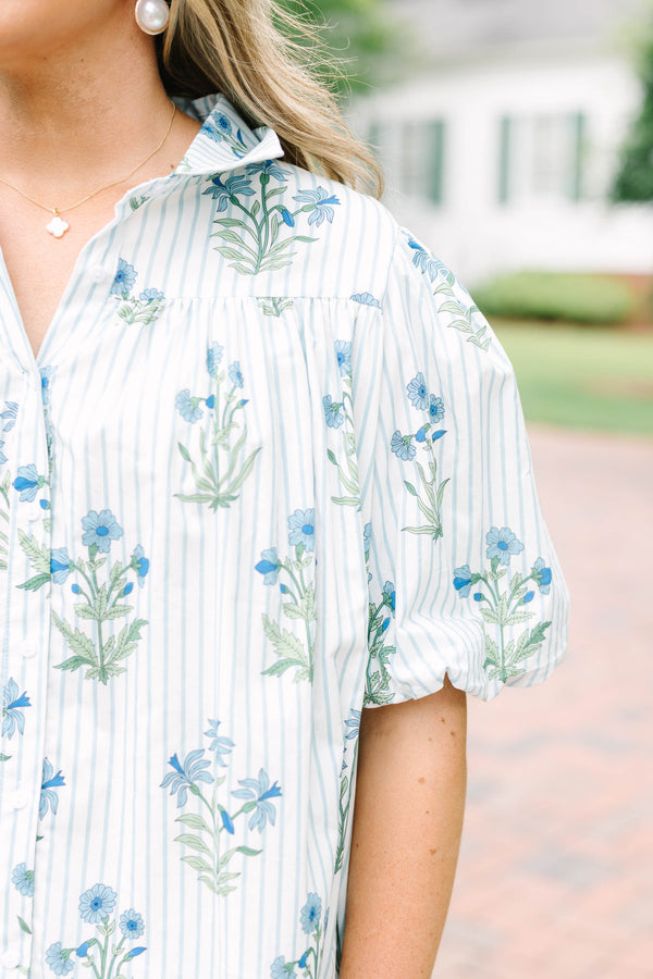 Plus Size blue and white striped button-down top with a floral print and puff sleeves.