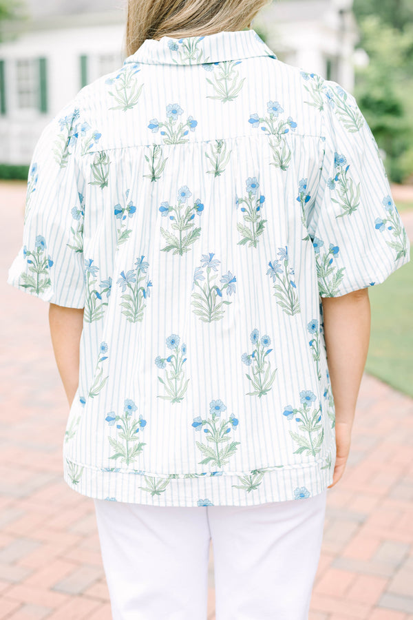 Plus Size blue and white striped button-down top with a floral print and puff sleeves.
