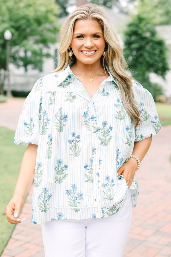 Plus Size blue and white striped button-down top with a floral print and puff sleeves.