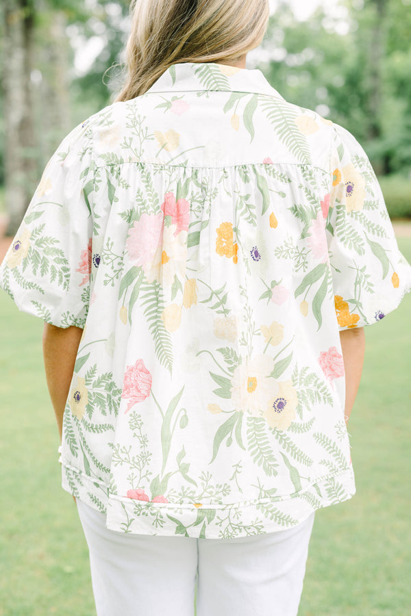 Plus Size cream button-down top with a floral print, puff sleeves, and a collared neckline.