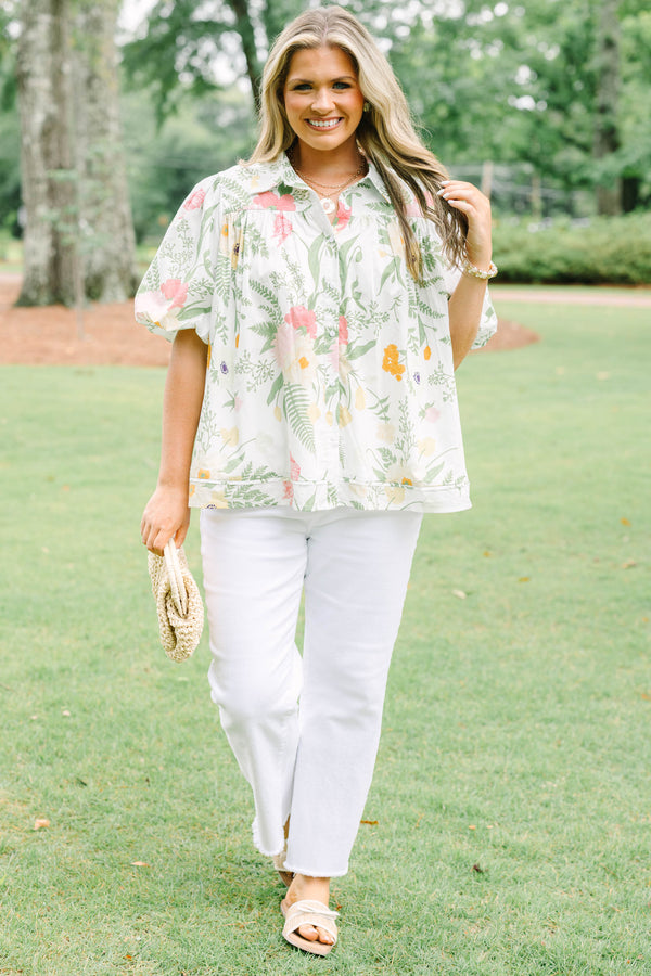 Plus Size cream button-down top with a floral print, puff sleeves, and a collared neckline.
