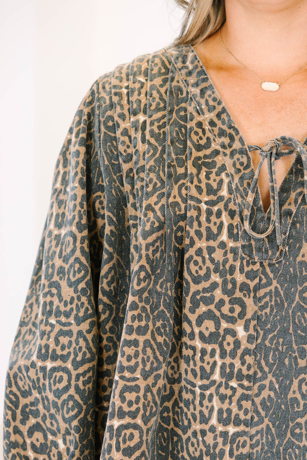 Plus Size leopard print cotton top with a tie-neck, long balloon sleeves, and a relaxed fit.