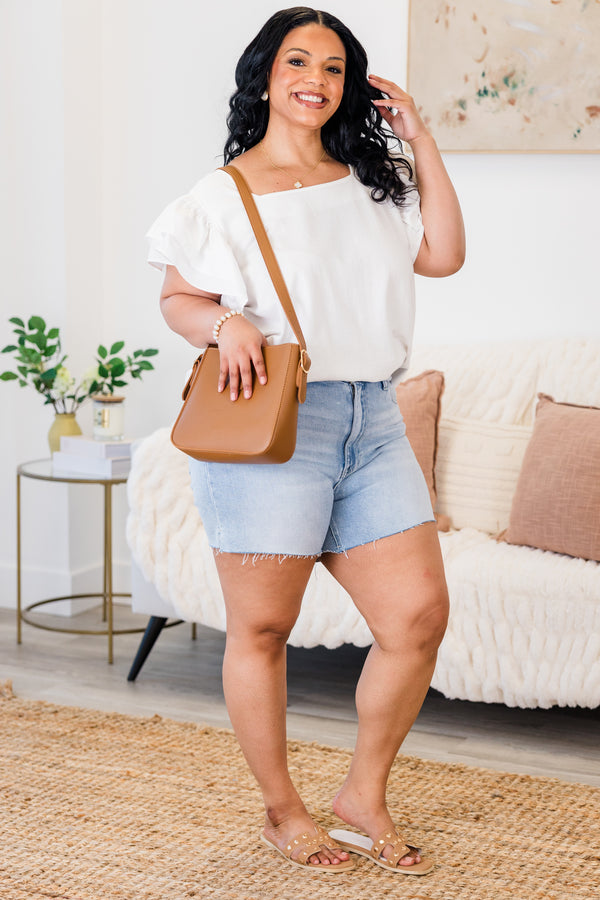 Chic Soul plus size clothing, light wash denim shorts with raw edge