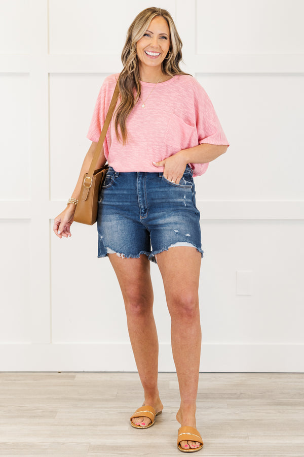 Chic Soul plus size clothing, mid-waisted dark wash distressed denim shorts with a silver button detailing 
