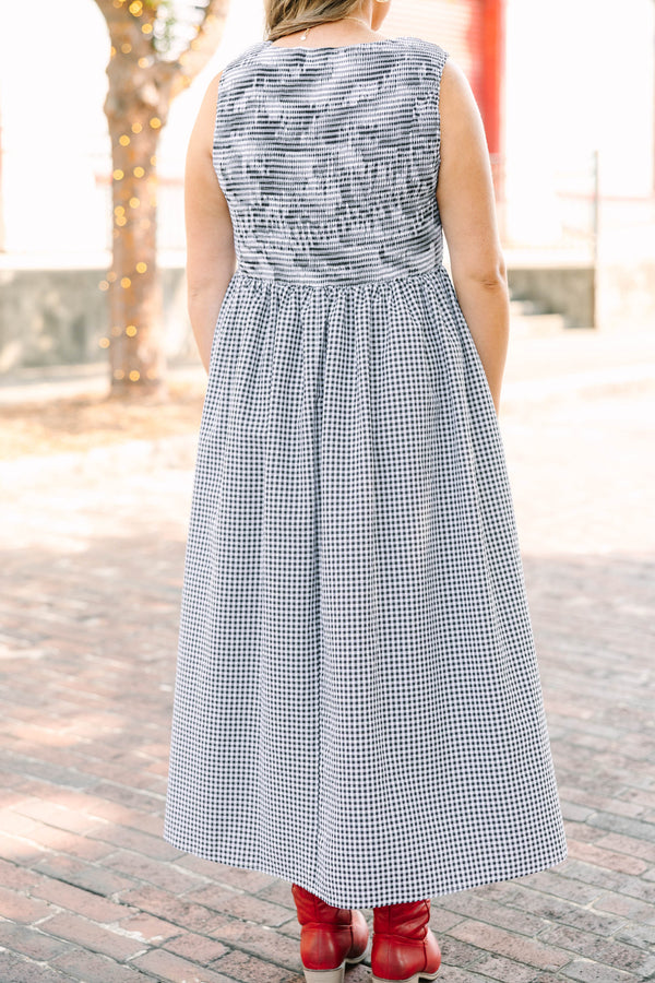 Plus Size black and white gingham midi dress with a sleeveless bodice and a tiered skirt.