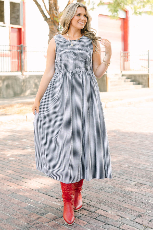 Plus Size black and white gingham midi dress with a sleeveless bodice and a tiered skirt.