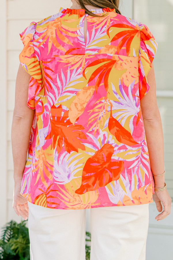Plus Size tropical floral print top with flutter sleeves and a ruffled neckline.