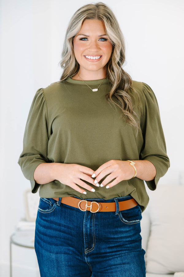 Plus size olive green top with puff sleeves and a relaxed fit