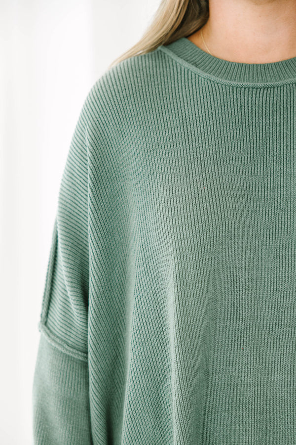 Chic Soul plus size clothing, olive colored sweater regular length, longer on the sides chunky sweater with outward seamlines