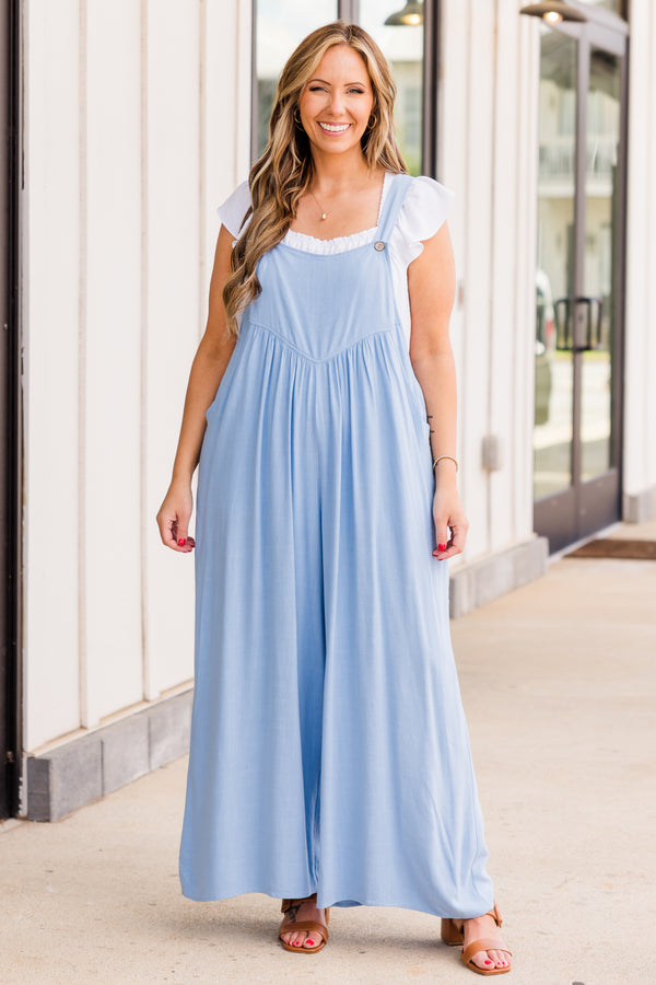 Chic Soul plus size clothing, light blue flowy overall jumpsuit with brown buttons near the straps