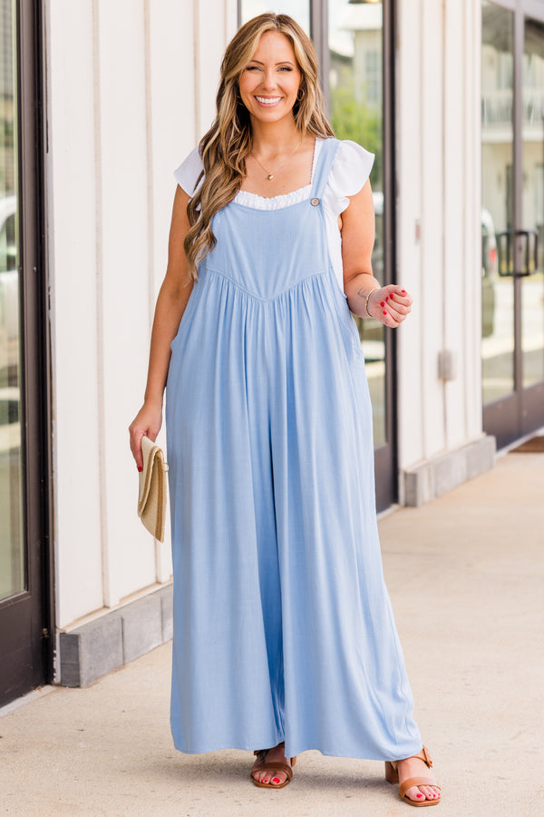 Chic Soul plus size clothing, light blue flowy overall jumpsuit with brown buttons near the straps