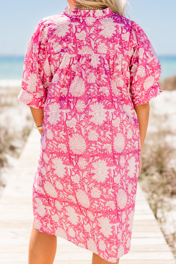 Plus Size pink floral cotton dress with puffed short sleeves, a v-neckline, and a relaxed fit.