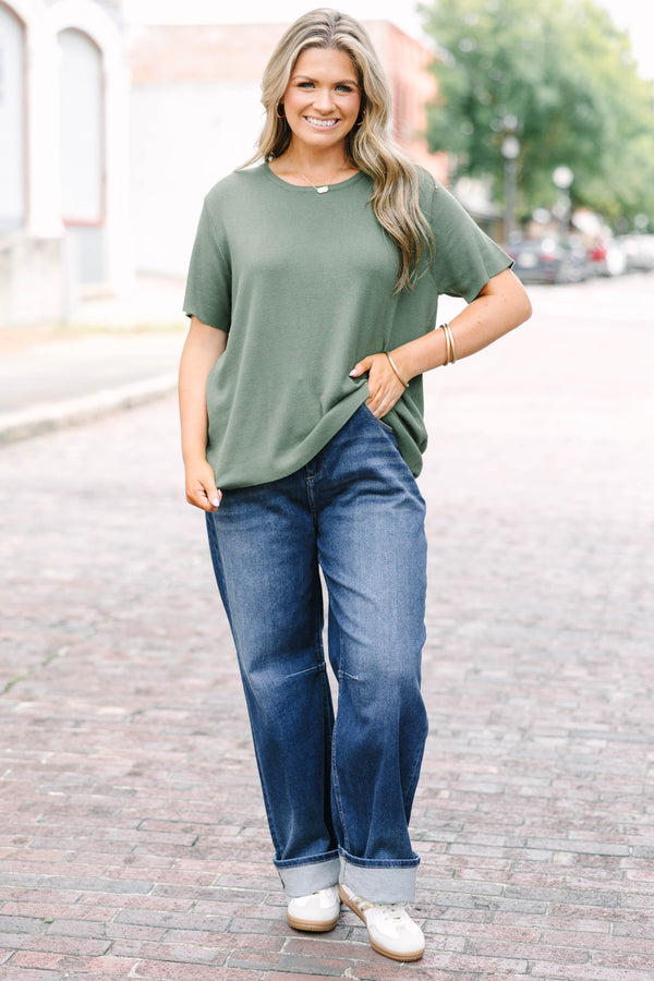 Plus Size dark wash barrel jeans with a relaxed fit 