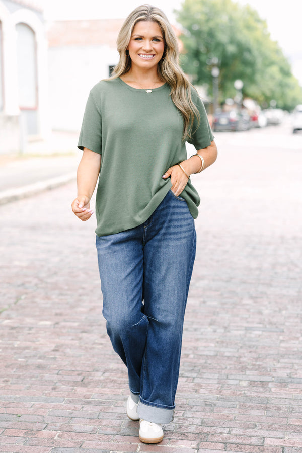 Plus Size dark wash barrel jeans with a relaxed fit 