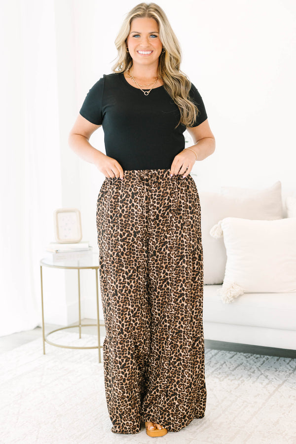 Plus size leopard print wide-leg pants with a flowy fit and comfortable elastic waist.