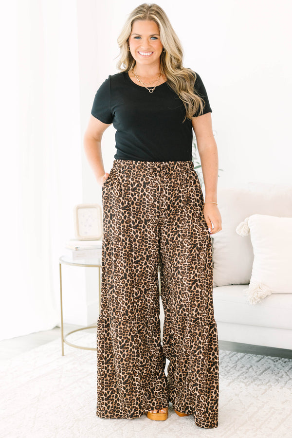 Plus size leopard print wide-leg pants with a flowy fit and comfortable elastic waist.