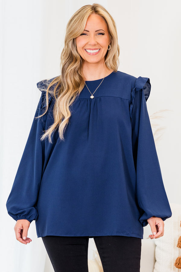 Chic Soul plus size clothing, navy long sleeve flowy long sleeve top with round neckline and bubble cuff sleeves with ruffle detail on shoulders