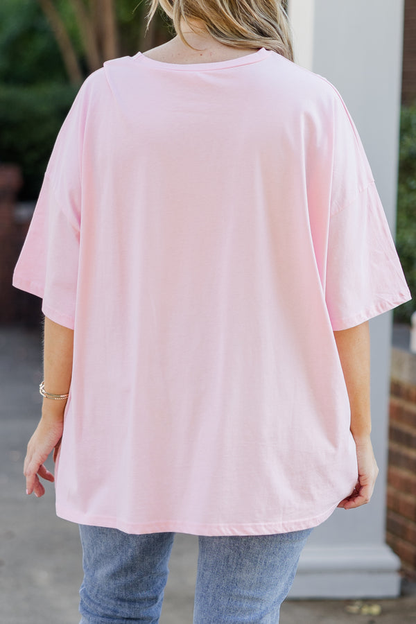 Chic Soul plus size clothing, short-sleeve cream pink boyfriend tee with scoop-neckline and graphic art of ghosts, pumpkins, bows, and other halloween related objects in a barbie pink