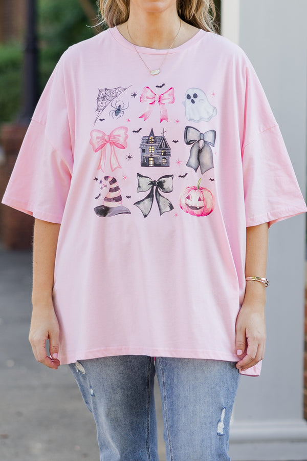 Chic Soul plus size clothing, short-sleeve cream pink boyfriend tee with scoop-neckline and graphic art of ghosts, pumpkins, bows, and other halloween related objects in a barbie pink