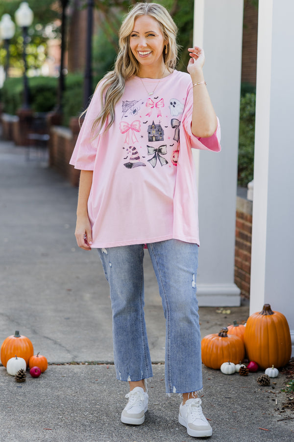 Chic Soul plus size clothing, short-sleeve cream pink boyfriend tee with scoop-neckline and graphic art of ghosts, pumpkins, bows, and other halloween related objects in a barbie pink