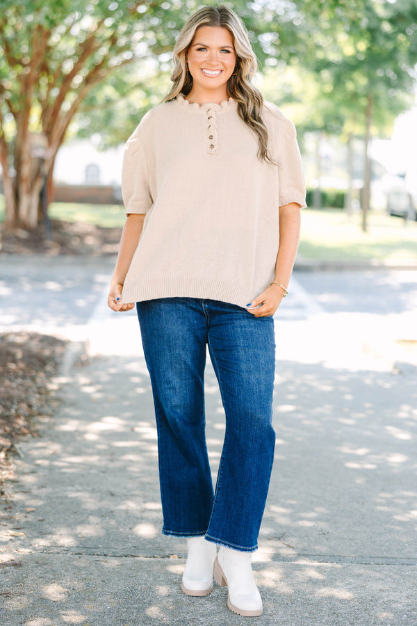 Plus size tan Sweater with short puff sleeves, ruffle neckline, and button details.