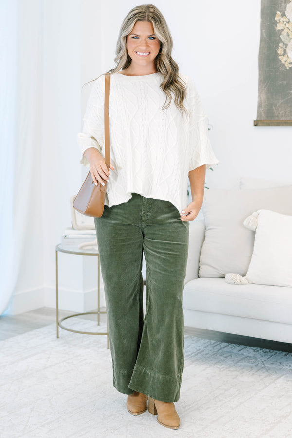 Plus Size moss green wide-leg corduroy pants with a button fly and front pockets.