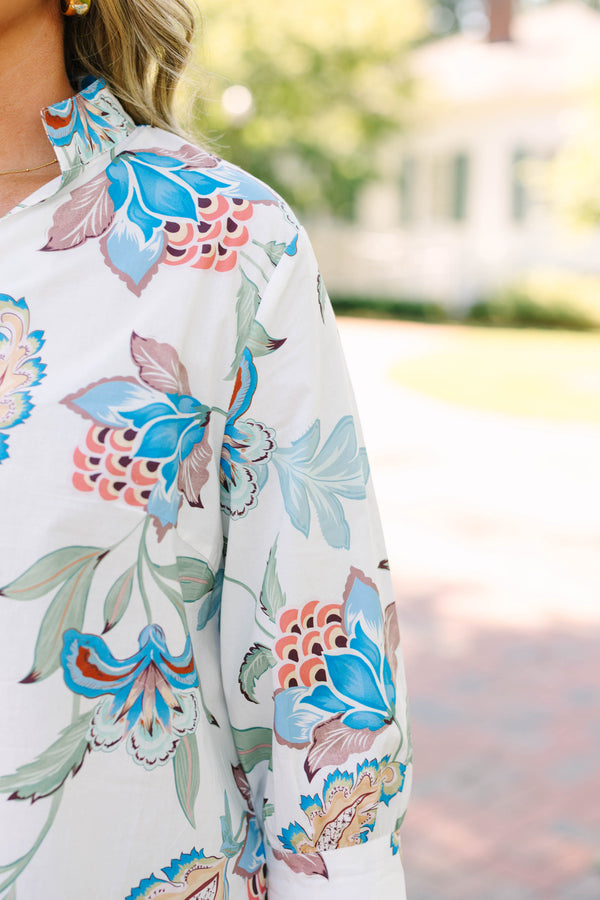 Plus Size white v-neck top with blue and pink floral paisley print, 3/4 sleeves, and scalloped hem.