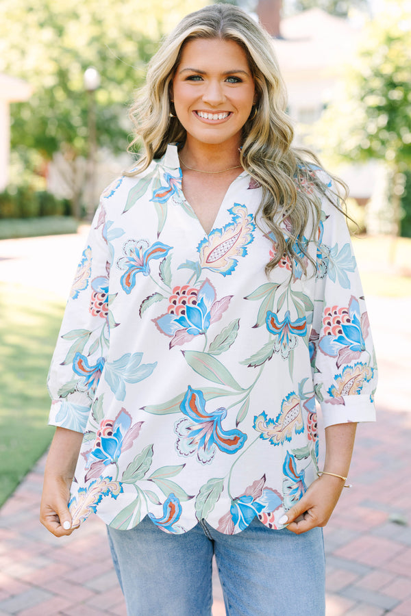Plus Size white v-neck top with blue and pink floral paisley print, 3/4 sleeves, and scalloped hem.
