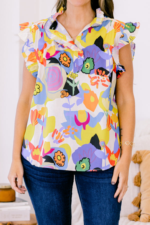 Chic Soul plus size clothing, white top with bold multicolor abstract pattern and flutter sleeves